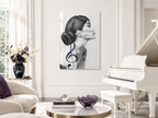 Sounds Like Me by Alexander Nicholas displayed as museum-quality wall art in a sophisticated contemporary interior.
Modern interior with a grand piano, decorative plant, and wall art of a woman with musical notes.